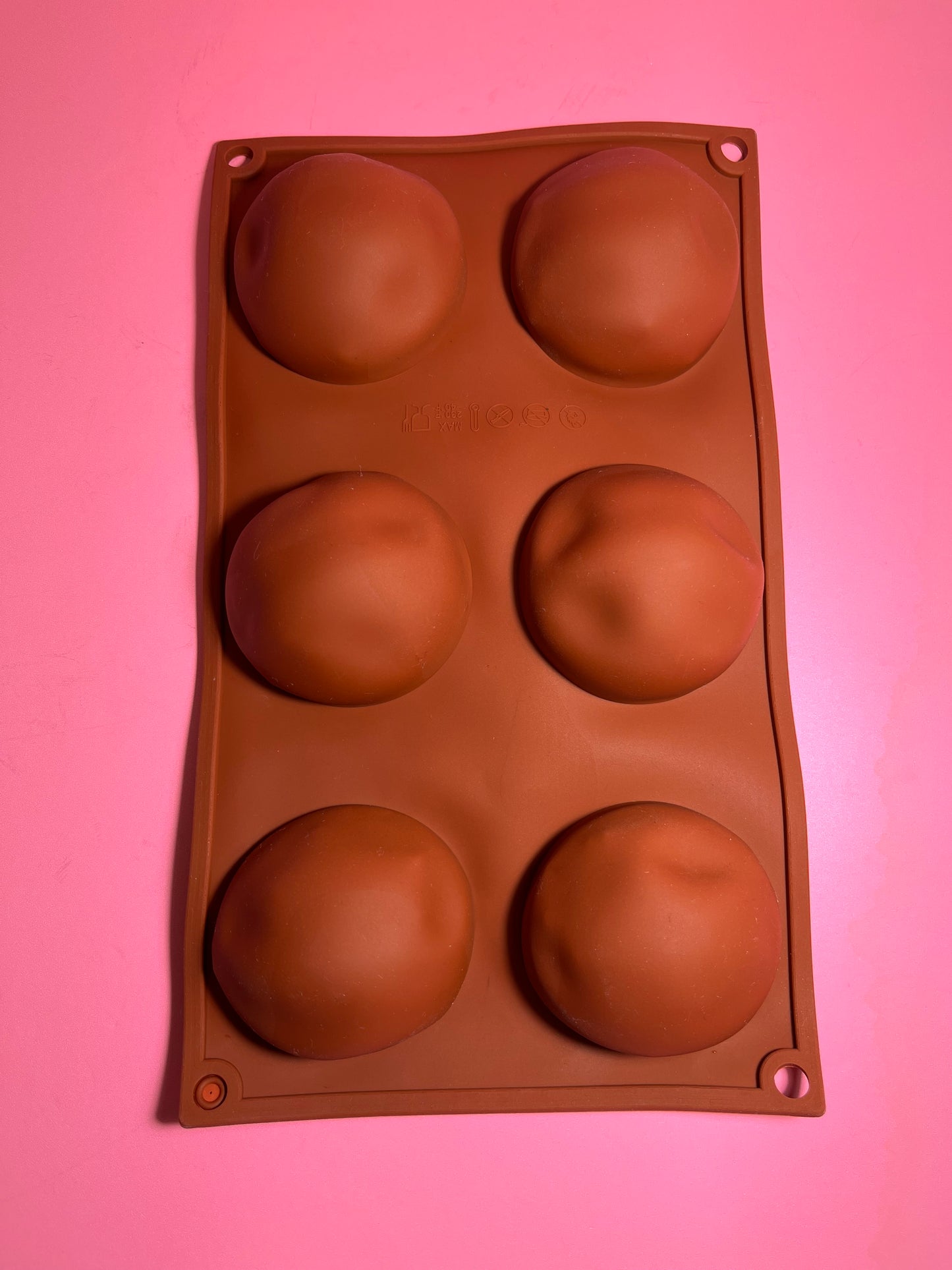6 cavity silicone half sphere mold. Perfect for chocolate treats.