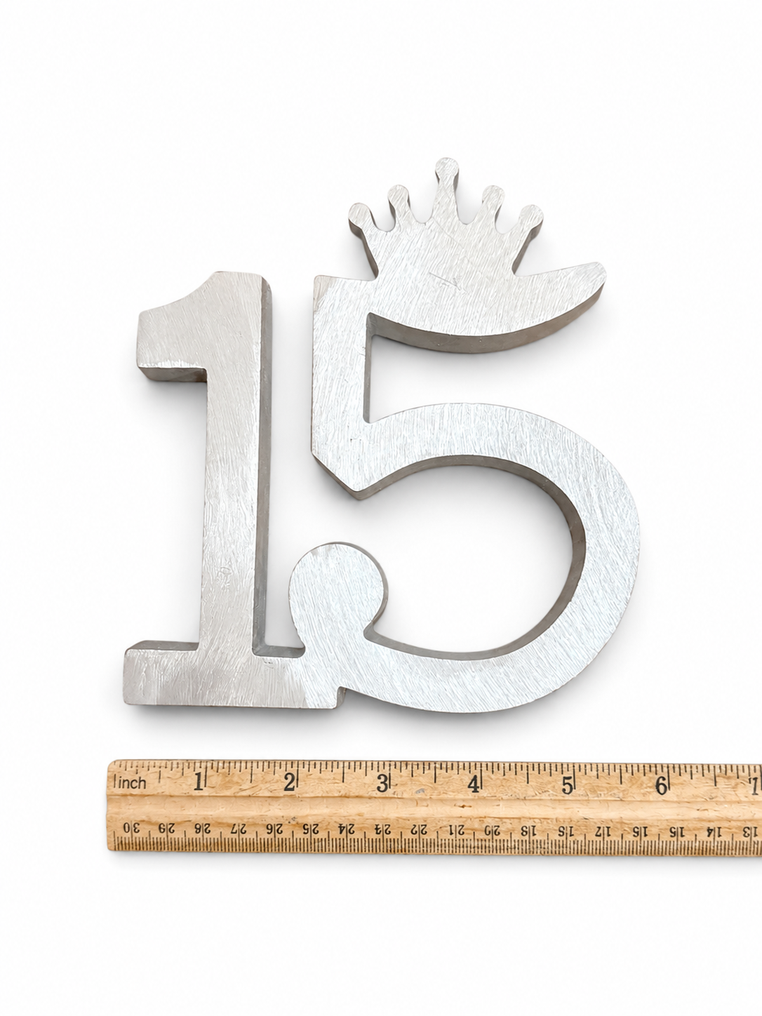 Quinceañera number 15 buñuelo mold with crown design and handle for making buñuelos for 15th birthday celebrations.