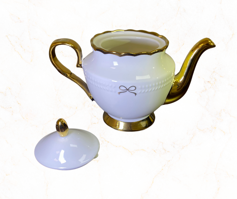 Elegant White Porcelain Teapot with Gold Trim ✨