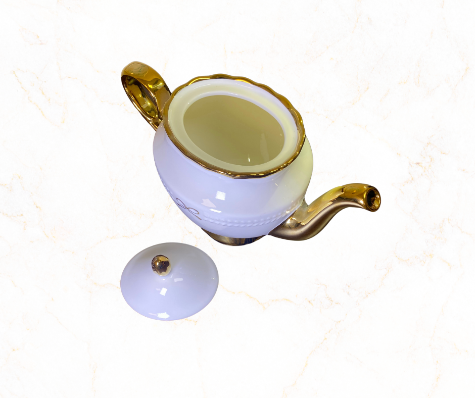 Elegant White Porcelain Teapot with Gold Trim ✨