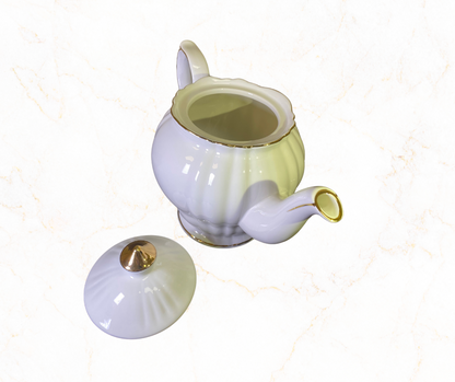 Elegant White Porcelain Teapot with Gold Trim ✨